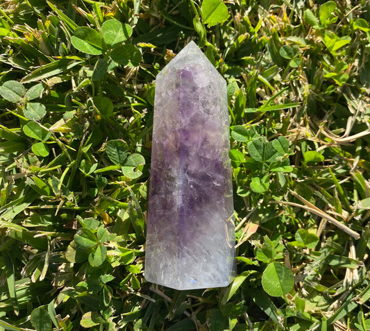 Stunning Amethyst Agate point is a 6 sided tower. Amethyst Agate is a combination of two specimens. Having the combination of both Amethyst and Agate minerals means they can help enhance protection against negative energy and provide positive energy, as well as achieving balance, stability and growth in your life.   Agate are stones with strong grounding ability that can promote balance to your mind, body and soul. 